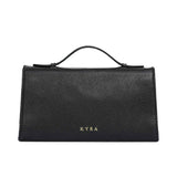KYRA handbag featuring a crocodile-textured top flap, a pebbled texture body, a single top handle, and a rectangular gold turn-lock closure.