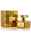 The Kajal Kolada perfume bottle standing next to its matching gold and mosaic-patterned luxury packaging.