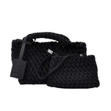Karisma woven handbag, designed to combine modern texture with practical elegance.