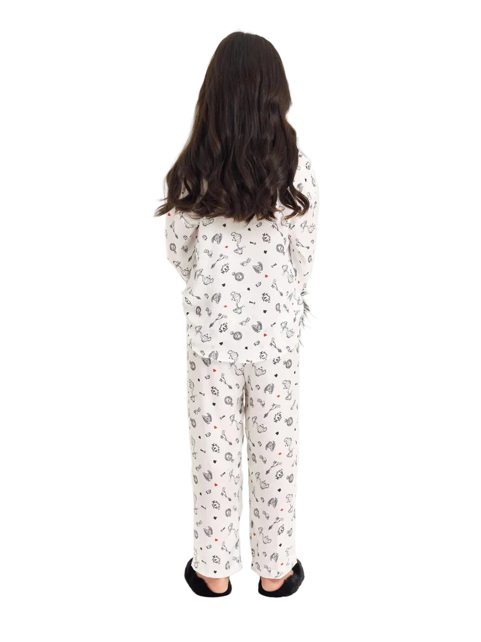 Full-length back studio shot of a young girl wearing the Katee's Kids white wonderland-print silk pajama set, showcasing the relaxed-fit trousers and matching long-sleeve shirt against a solid white background.