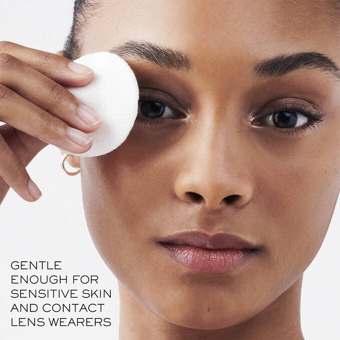 A white, round, fluffy cotton pad.