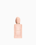 Light pink Giorgio Armani Si Nude Bloom Eau de Parfum bottle with an embossed 'SI' logo and a gold-toned neck.
