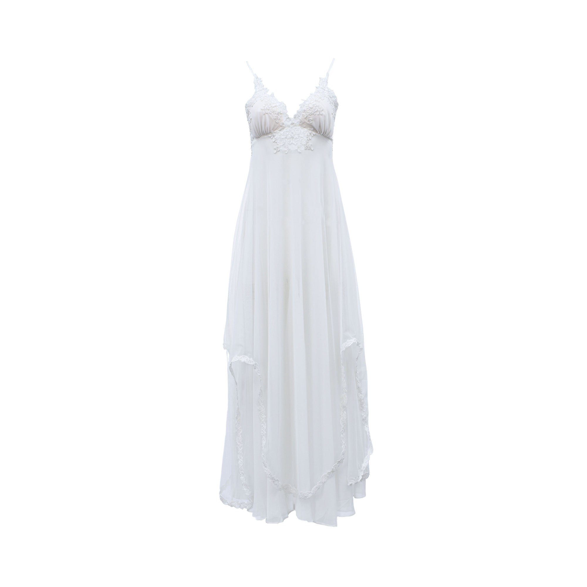 Ivory chiffon long dress with spaghetti straps. V-neck top has intricate floral lace embroidery. Flowing skirt features lace