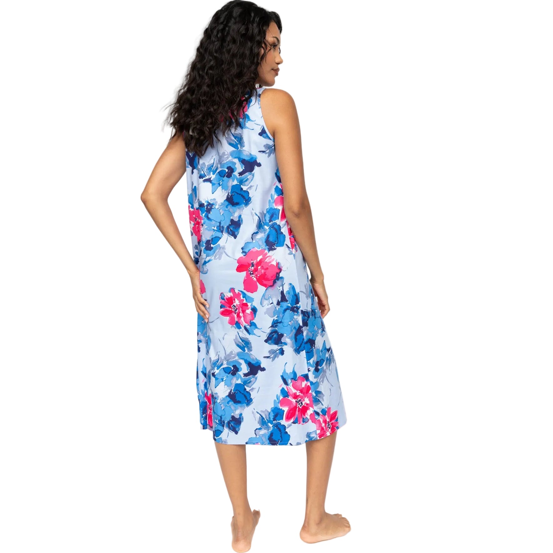 Light blue sleeveless nightdress with a vibrant floral print in shades of blue and pink. Loose-fitting, calf-length.