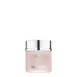 A premium jar of La Prairie Switzerland Cashmere Body Cream. The product features a translucent, frosted glass jar showcasing the pale pink cream inside, topped with a reflective, high-shine silver lid. The brand name "LA PRAIRIE SWITZERLAND" and "CASHMERE BODY CREAM" are printed in clean, silver sans-serif typography on a white background.