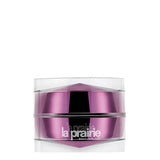 A luxury skincare jar of La Prairie Platinum Rare Haute-Rejuvenation Cream. The jar features a unique multi-faceted, diamond-shaped inner core in a metallic amethyst purple, encased in a clear, high-gloss outer shell. The La Prairie Switzerland logo is printed in silver on the front.
