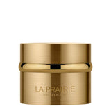 A luxury skincare jar of La Prairie Switzerland Pure Gold Radiance Cream. The container features a brushed gold metallic finish with a polished gold band around the center. The brand name and "Switzerland" are elegantly embossed in silver lettering on the lower half of the jar.