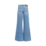 Ermanno Firenze light blue wide-leg denim trousers featuring high waist, contrast stitching, and white floral lace embroidery on the upper thighs.