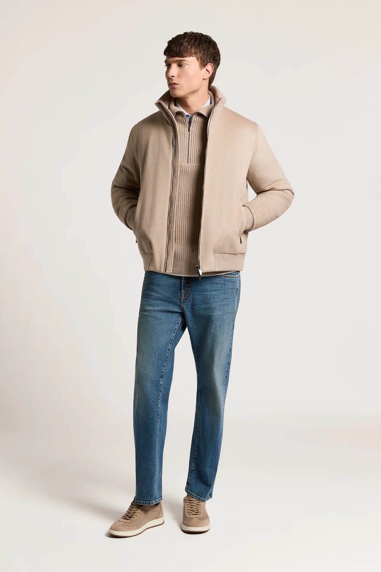 Earth beige bomber jacket with a stand-up collar, full silver-toned zip closure, ribbed cuffs and hem, and two zippered front