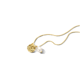 Gold-toned necklace with a delicate chain, featuring a round hammered gold-toned pendant and a white baroque pearl drop.