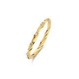 Yellow gold plated twisted ring with five small clear stones embedded along the band.