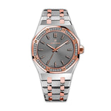 MONTEVA ladies' watch with a grey sunray dial, rose gold-toned octagonal bezel with clear stones, and a silver and rose gold-