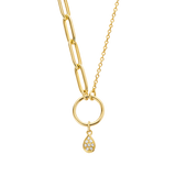 Yellow gold plated necklace with mixed chain, circular connector, and a teardrop pendant embellished with clear stones.