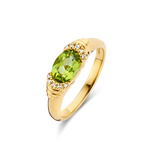 Yellow gold-plated ring with a vibrant green oval-cut central gemstone, flanked by clusters of small clear accent stones.