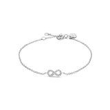 White plated delicate chain bracelet with a central infinity symbol embellished with clear stones, secured by a lobster clasp