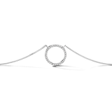 White-plated necklace with a thin chain and a circular open pendant encrusted with clear sparkling stones.