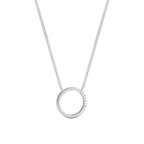 Silver-toned necklace with a thin chain and a circular pendant. One side of the pendant is smooth, the other is set with smal