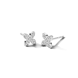 Pair of silver-toned flower stud earrings, each adorned with clear, sparkling stones.