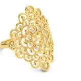 Gold-toned ring with a wide, domed top featuring an intricate openwork filigree design of concentric scalloped shapes and sma