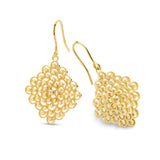 Gold-toned diamond-shaped earrings. Each features a beaded filigree pattern with a small clear stone, on a fishhook.