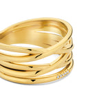 Gold-toned linear ring with multiple intertwined bands, one band featuring five small clear stones.