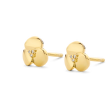 Pair of gold-toned stud earrings, each featuring a three-petal flower design with three sparkling clear stones in the center.