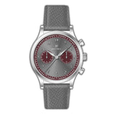A silver-toned Monteva vintage chronograph watch with a grey sunburst dial, burgundy sub-dials, Arabic numerals, and a grey t