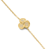 Gold-toned chain bracelet with a three-petal flower charm. Each petal is textured and features pavé-set clear stones, with on