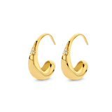Pair of small, C-shaped yellow gold-plated hoop earrings with three clear stones set on the upper curve.