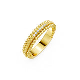 Yellow gold-plated ring with two beaded bands flanking a central row of five clear stones.