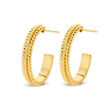 Pair of gold-toned C-hoop earrings. Each features a beaded outer edge with a row of clear stones, and a smooth inner edge.