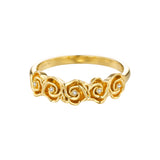 Gold-toned ring with five rose-shaped motifs across the top, each featuring a small clear stone in its center.