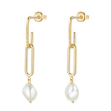 Pair of yellow gold plated paperclip link drop earrings with clear embellishments and irregular white pearl drops.