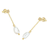 Pair of gold-toned drop earrings with square studs featuring four clear stones, dangling chains, and irregular white baroque