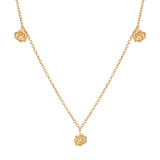 Yellow gold-plated delicate chain necklace with three rose-shaped charms, each featuring a small clear stone.