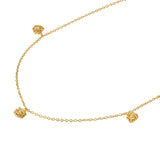 Gold-toned chain necklace with three gold-toned rose charms, each featuring a small clear stone.