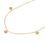 Gold-toned delicate link chain necklace with three small rose charms, each featuring a tiny clear stone in its center.