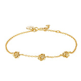 Yellow gold-plated chain bracelet with three rose-shaped charms, each featuring a small clear stone, and a lobster clasp.