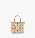Rear view of the MCM Mini Toni Shopper in beige Visetos canvas featuring a slip pocket and leather trim.