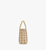 Side profile of the MCM Mini Toni Shopper highlighting its structured silhouette and Nappa leather handles.