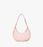 Back view of the small hobo bag highlighting the classic black MCM Visetos monogram on the soft pink coated canvas.