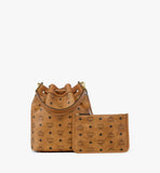 The Dessau Drawstring Bag displayed alongside its matching detachable Visetos monogram zip pouch.