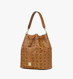 A perspective view highlighting the bucket silhouette and the detachable Nappa leather shoulder strap.