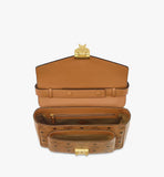 An overhead view of the bag's interior revealing multiple compartments, a zippered pocket, and the front slip pocket.