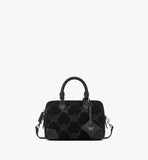 Front view of the MCM Ella Boston Bag in Black Lauretos Lurex Jacquard featuring rolled leather handles and a subtle metallic sheen.