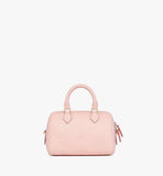 The back of the Ella bag showing the continuous embossed Maxi Monogram pattern and smooth leather trim.