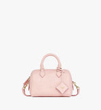 Front view of the MCM Small Ella Boston Bag in Lotus Pink with embossed Maxi Monogram leather and rolled top handles.