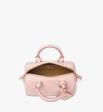 An overhead view of the Ella bag showing the extended gold-tone zipper and the spacious pink interior with organized pockets.