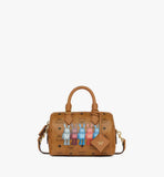 Front view of the MCM Ella Boston Bag in Cognac Visetos with architectural black leather trim and rolled handles.