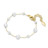Gold-toned chain bracelet with varying size white pearls, a lobster clasp, and an extender chain with a "POLICE" charm.